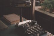 Dark vintage writing desk and manuscript atmosphere for Robert M. Price's MOLDY MANUSCRIPTS vol. 01