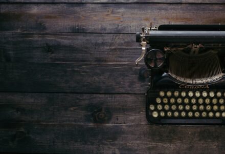 Vintage typewriter representing the Barry B. Longyear interview about science fiction and writing