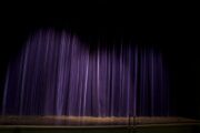 Dark theater stage and curtains evoking the dreamlike puppet imagery of Thomas Ligotti's horror fiction