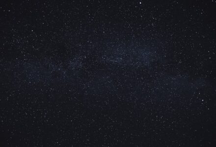 Star-filled night sky illustrating cosmic horror and humanity's small place in the universe