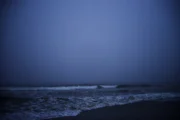Dark ocean waves suggesting the scale and indifference of cosmic horror