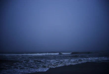 Dark ocean waves suggesting the scale and indifference of cosmic horror